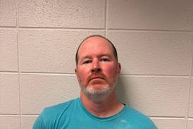 Teacher accused in sending child sexual images to remain in jail