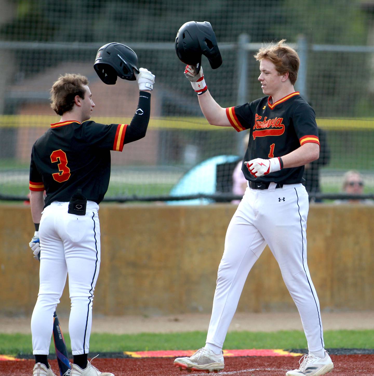 Batavia's Keegan Harp celebrates his homerun with teammate Nolan Zimberoff during a game against St. Charles North on Thursday, April 24, 2025 in Batavia.